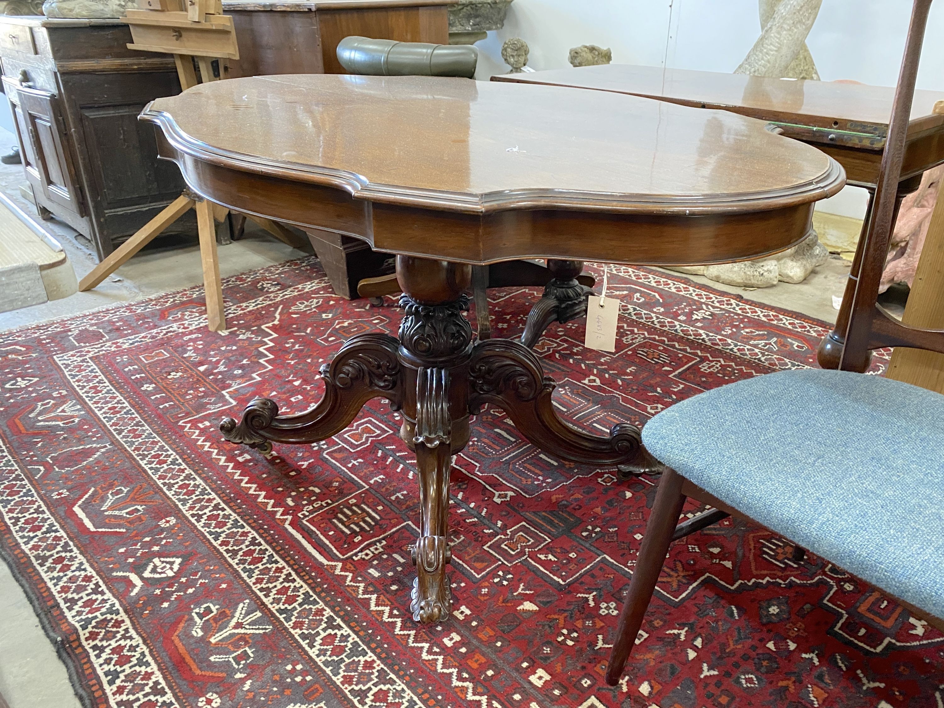 A Victorian oval rosewood tilt top centre table, width 132cm, depth 84cm, height 74cm